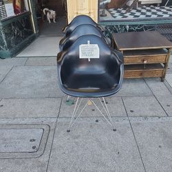 Eames Style Molded Plastic Armchairs