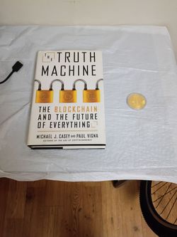 Book Hardback with rare Bitcoin Coin.