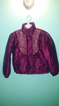 Girls purple jacket. ..size small fits 7/8 year old..great condition!