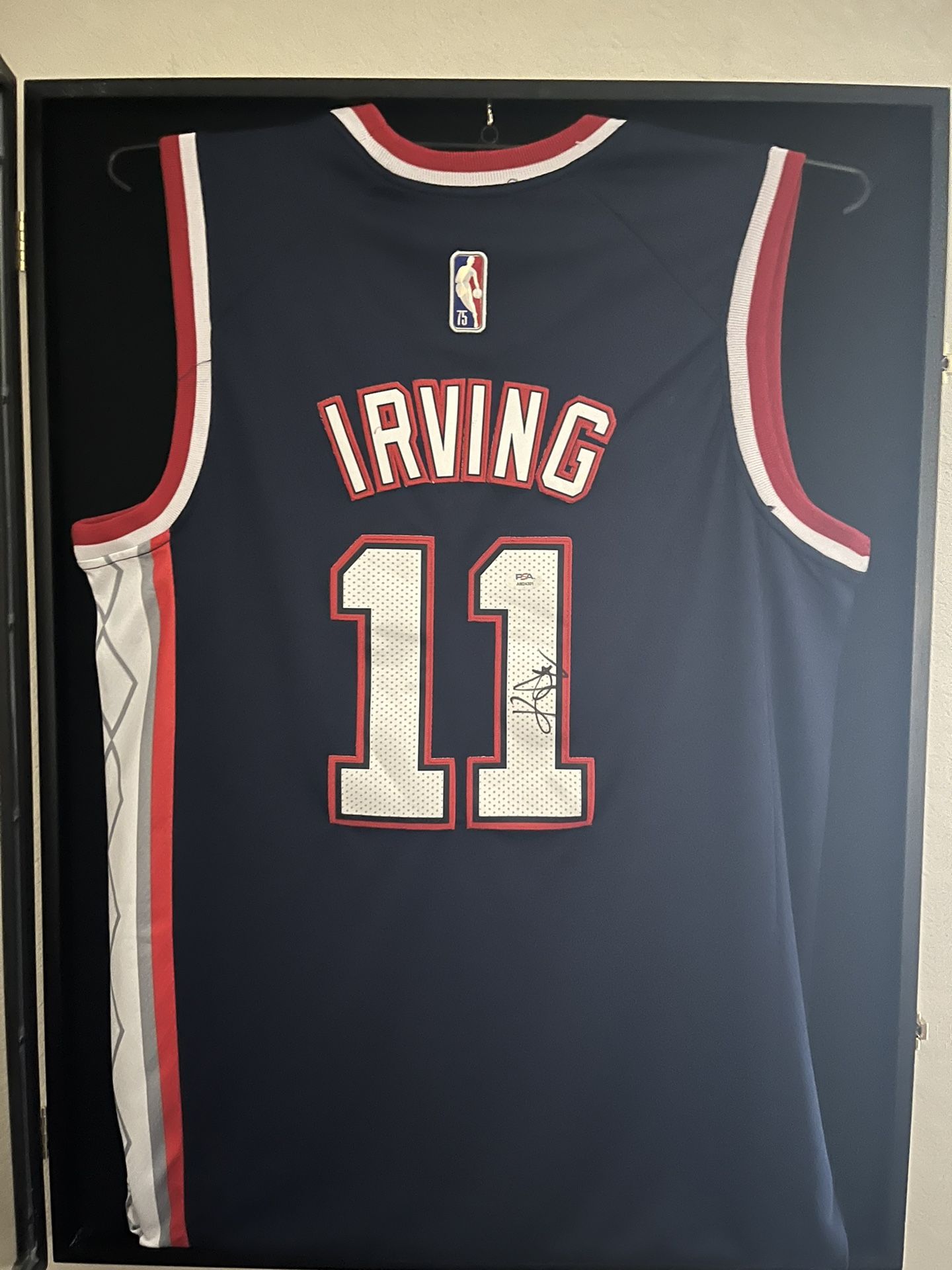 Kyrie Irving Autographed Nets Throwback Jersey w/ COA + Case