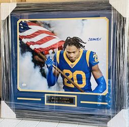 Autographed Rams football Pic