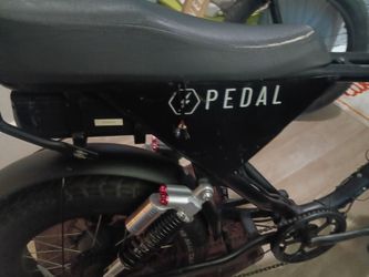 Full suspension pedal electric bike with charger