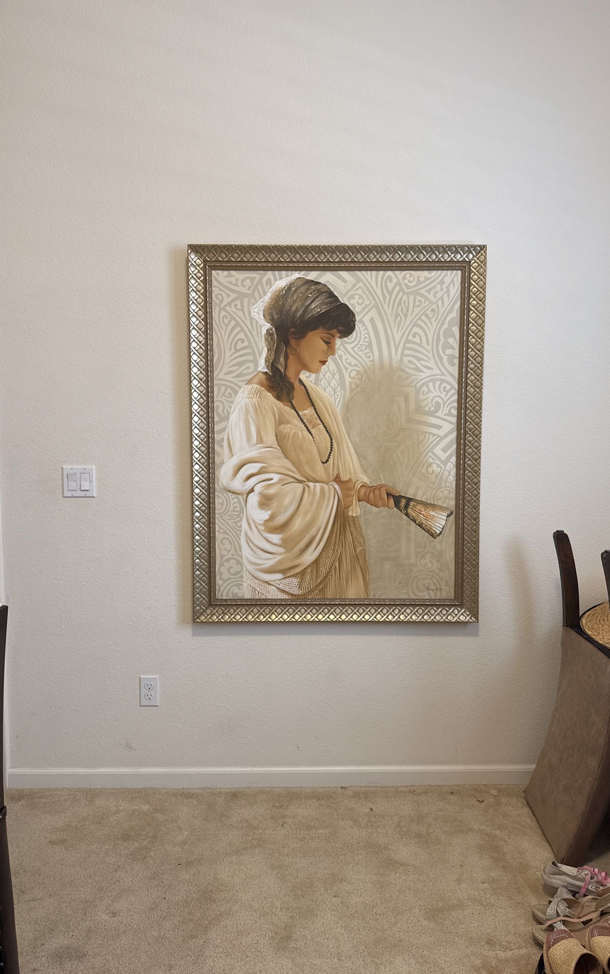 Lady holding a fan
