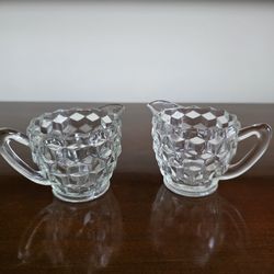 Pair of pressed glass small creamers in Cube pattern by Jeannette Glass Company