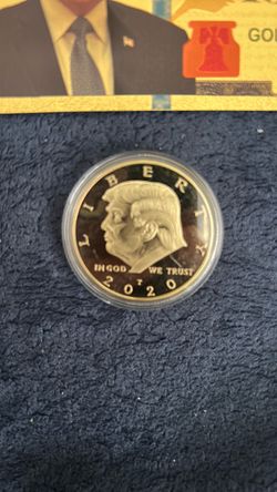 Donald trump gold foil 1000$ bill and half dollar.