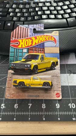 Hot Wheels Mazda REPU Yellow Die-Cast
