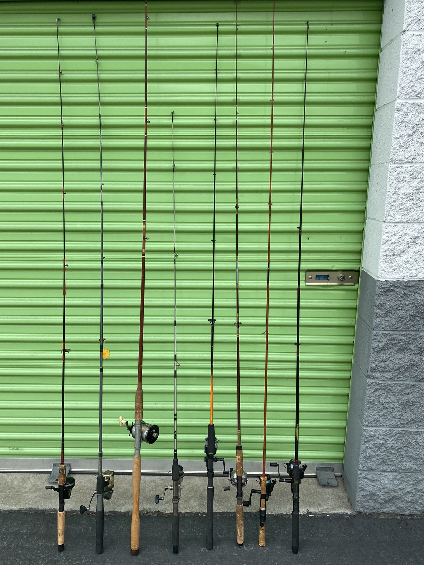 LOT OF FISHING RODS WITH REELS