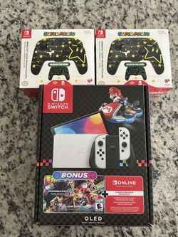 Nintendo Switch OLED + 2 PDP Glow Controllers – Mario Kart Bundle (code used)