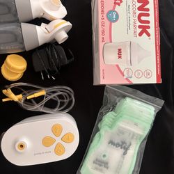 medela breast pump and bottles + storage bags 