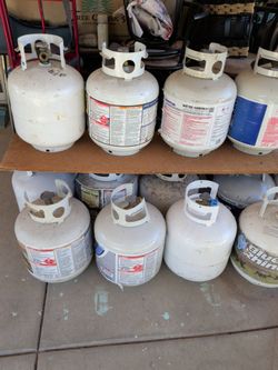 Propane tanks half full $15 each
