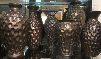 Bronze color vases by local artist $10 each