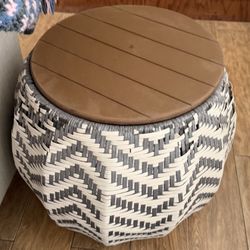 woven round  patio side table with a storage and wooden top