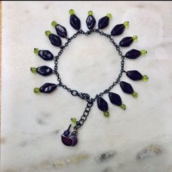 Purple and green glass bracelet with wine charm NEW