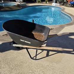 True Temper 6 cu. ft. Steel Wheelbarrow with Wood Handles Deep Bucket Metal Wheelbarrow