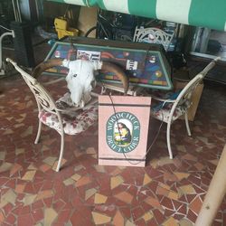 Pool Table Light, Wooden Beer Sign And A Bull Skull