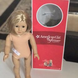 American Girl Kit Doll in excellent condition. Limbs are tight and her hair is super soft and silky. I looked her over and don't see any marks or flaw