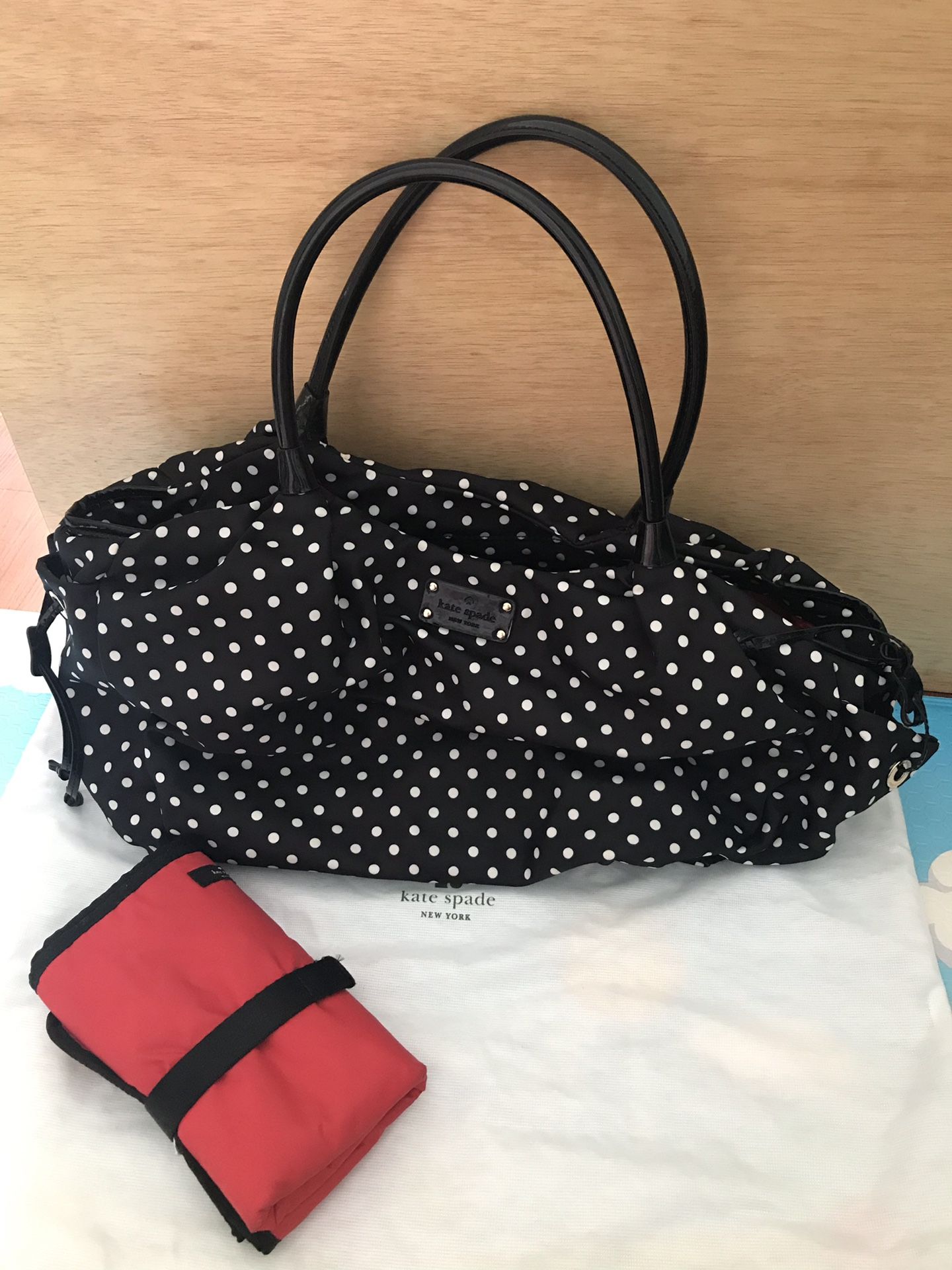 Kate spade diaper bag with changing pad