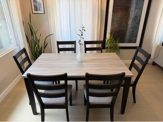 Six person dining table and chairs. Newly purchased and assembled