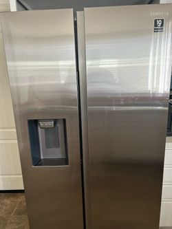 Samsung Stainless Steel Side-by-Side Refrigerator with Ice & Water Dispenser