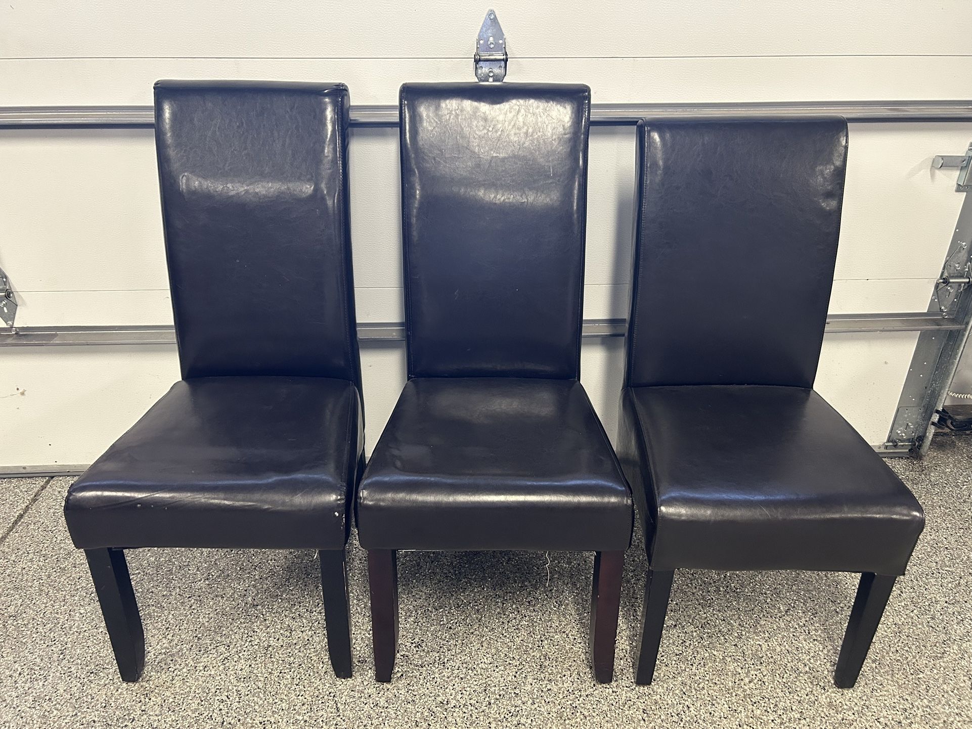 3 Different Leather Dining Chairs