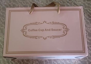 Warming cup and saucer