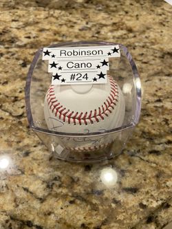 Signed Baseball By Robinson Cano