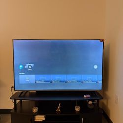 TLC 55 INCH UHD + TV STAND