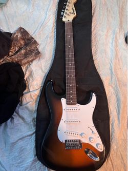 Electric guitar comes with  speaker