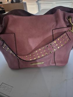 Woman's bag and a hot coffee termo 10$