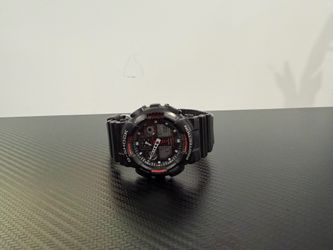 G-SHOCK GA-100 Men's Shock-Resistant Analog Digital Black Resin Sports Watch