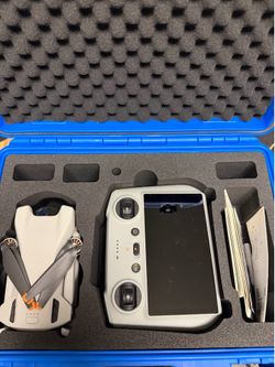 DJI mini 3 w/ RC controller and case