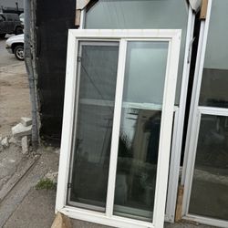 Assorted Vinyl And Aluminum Windows And Doors