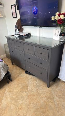Grey dresser with glass top