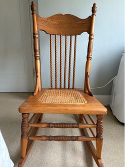 Antique oak sewing rocker with cane seat