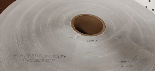 RR Donnelley Label Linerless FICS Continuous Roll 17” OD FSS 75mm Bore X 4-3/8”