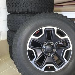 775$