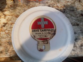 Old car license plate topper Gothic ambulance and hearse service