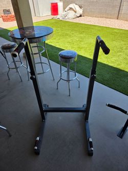 Adjustable dip stand