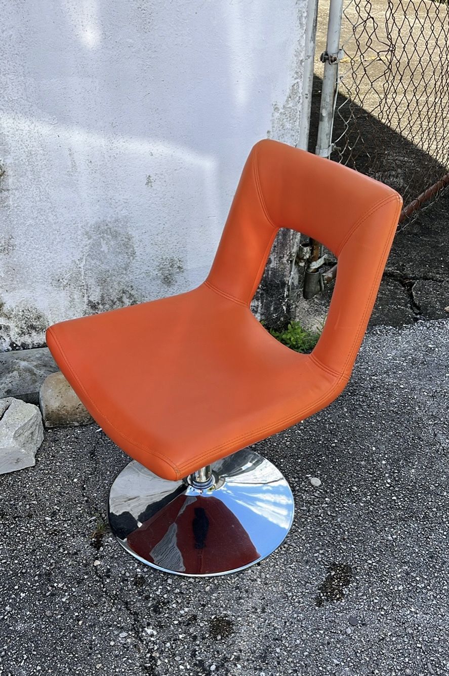 Modern Cutout Swivel Chair Orange On Pedestal