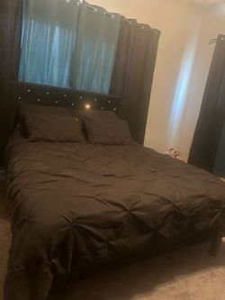 Queen upholstered bed frame