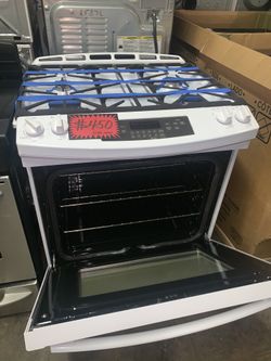 GE slide-in gas range like new conditions with 4 months warranty