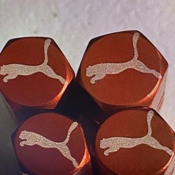 Puma tire valve stem caps four pack