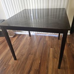 Raised dining table with 4 chairs