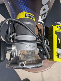 Ryobi R1631G 8.5-Amp 1-1/2 Peak HP Fixed Base Corded Router, designed for precision woodworking, trimming, and edge-forming.