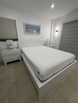 Queen size bed with hydraulic lift storage with night stands