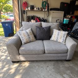 Gray Fabric Loveseat with Throw Pillows