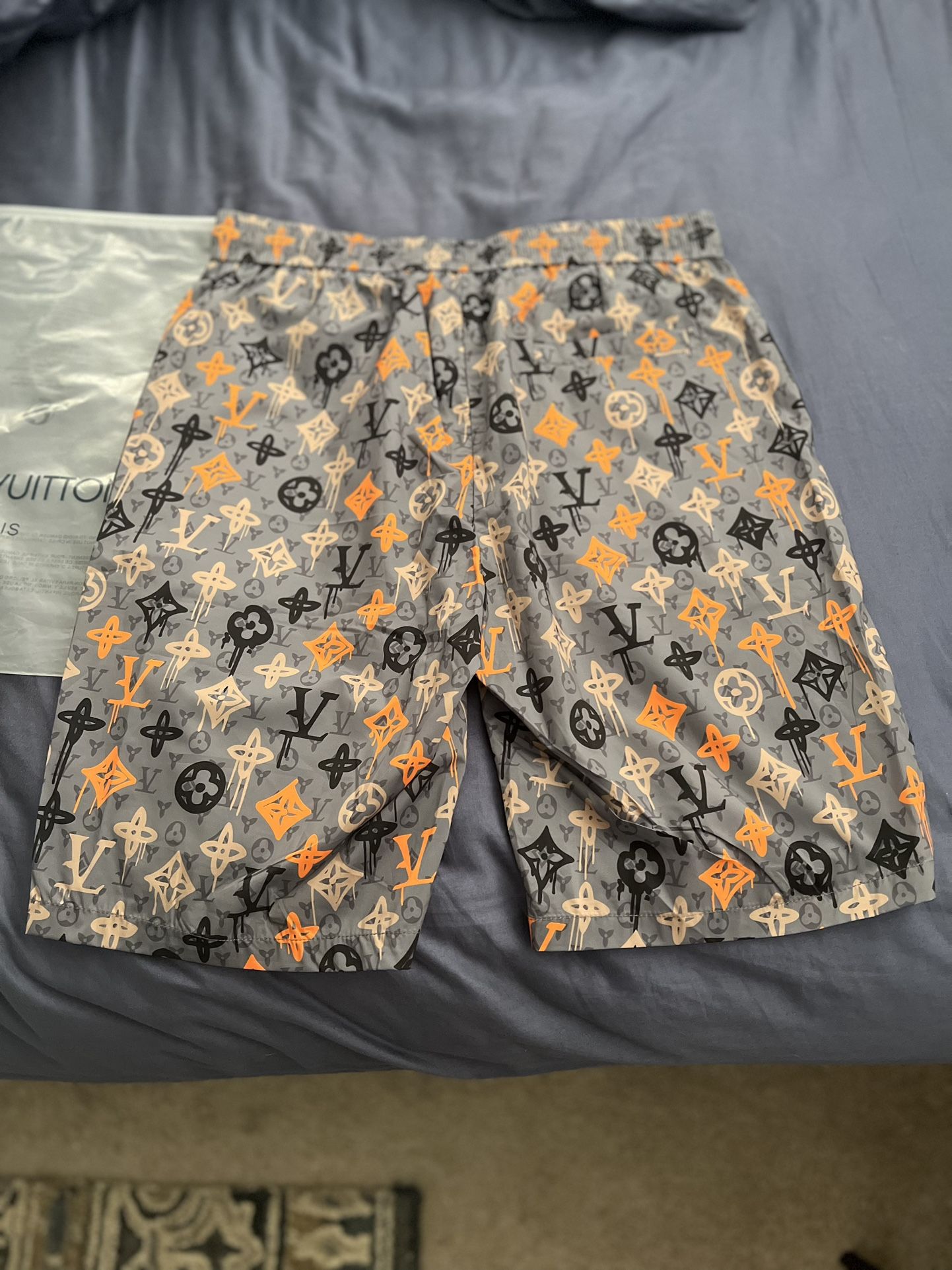 Louis Vuitton reflective monogram shorts/trunks (same shorts in each pic)  for Sale in Atlanta, GA - OfferUp