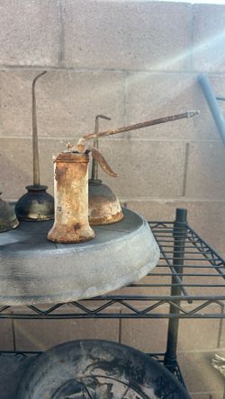 Set Of Four Antique Oil Cans