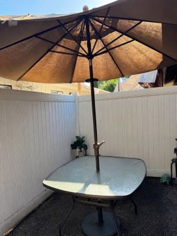 Patio table and umbrella