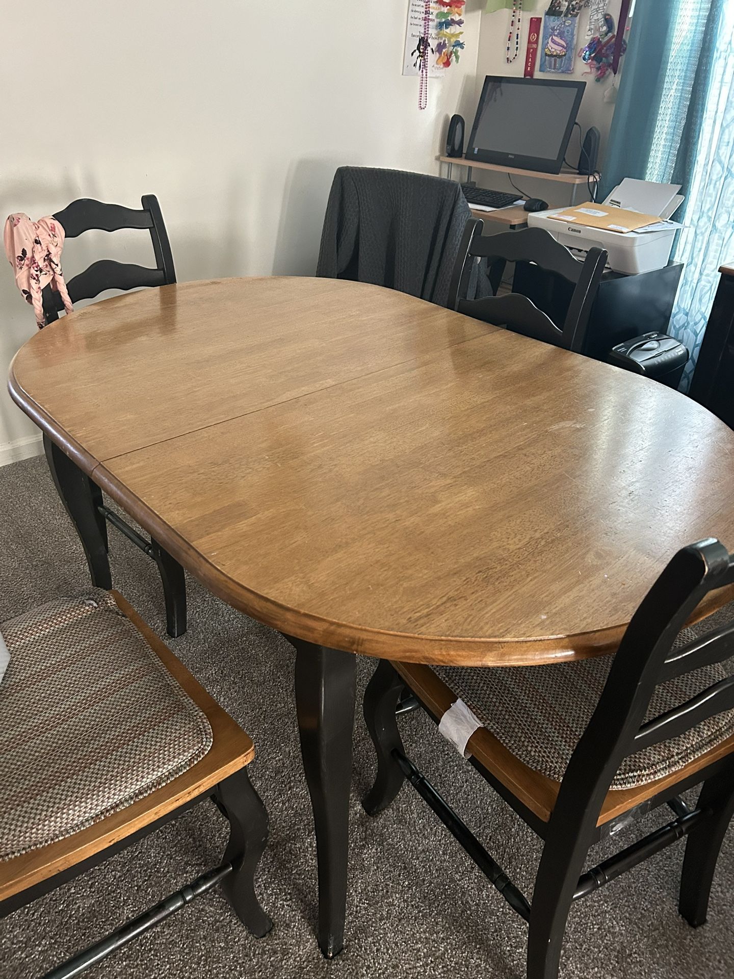 A Table With Six Chairs